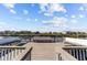 Scenic view from the wooden dock, featuring ample seating and a serene waterfront backdrop at 3788 Waterford Dr., Myrtle Beach, SC 29577