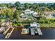 Expansive property featuring a dock and luxurious pool area at 3788 Waterford Dr., Myrtle Beach, SC 29577
