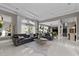 Bright living room featuring tile floors, large windows, and modern decor at 3788 Waterford Dr., Myrtle Beach, SC 29577