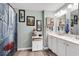 Bright bathroom with a double vanity, artistic shower curtain, and fresh decor at 568 Affinity Dr., Myrtle Beach, SC 29588