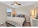 Bedroom featuring a queen-sized bed, a dresser, soft carpet and lots of natural light at 568 Affinity Dr., Myrtle Beach, SC 29588