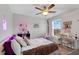 Bright bedroom with a ceiling fan, a hanging chair and decoratively adorned walls at 568 Affinity Dr., Myrtle Beach, SC 29588