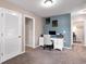 Well-lit home office featuring a white desk, comfortable chair, and neutral decor at 568 Affinity Dr., Myrtle Beach, SC 29588