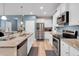 Modern kitchen with stainless steel appliances, granite countertops, and ample cabinet space at 568 Affinity Dr., Myrtle Beach, SC 29588