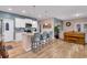 Modern kitchen with granite countertops, island seating, and a seamless transition to the living area at 568 Affinity Dr., Myrtle Beach, SC 29588