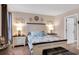 Comfortable bedroom with stylish decor, lamps, and a beautiful bed at 568 Affinity Dr., Myrtle Beach, SC 29588