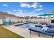 Beautiful in-ground pool with lounge chairs, an umbrella and a patio table at 568 Affinity Dr., Myrtle Beach, SC 29588