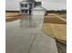 Two-story house with gray siding, white trim, and a two-car garage at 885 Busy Corner Rd., Conway, SC 29527