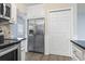 Kitchen with stainless steel refrigerator and pantry at 9659 Kings Grant Dr., Murrells Inlet, SC 29576