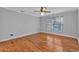 Bedroom with hardwood flooring, natural lighting, and neutral wall color at 1305 Conifer Ct., Murrells Inlet, SC 29576