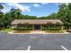 Community clubhouse with inviting entrance and manicured landscaping at 1305 Conifer Ct., Murrells Inlet, SC 29576