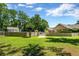 Community pool area with fence and various seating options, perfect for relaxation at 1305 Conifer Ct., Murrells Inlet, SC 29576
