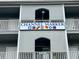 Channel Marker building signage with nautical flags at 1317 S Ocean Blvd. # 304, Surfside Beach, SC 29575