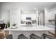Kitchen featuring an island with barstool seating and stainless steel appliances at 167 Waterloo St., Longs, SC 29568