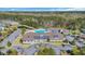 Community amenities include an inviting pool, clubhouse, and manicured landscaping, all surrounded by mature trees at 138 Sugar Loaf Ln., Murrells Inlet, SC 29576
