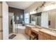 Bathroom features large vanity, soaking tub, glass enclosed shower, and decorative accents at 138 Sugar Loaf Ln., Murrells Inlet, SC 29576