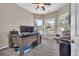 Bright office/bedroom with carpeting, a ceiling fan and great natural lighting at 138 Sugar Loaf Ln., Murrells Inlet, SC 29576