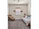 Cozy bedroom featuring a comfortable chair, futon, and neutral decor, perfect for relaxation and unwinding after a long day at 138 Sugar Loaf Ln., Murrells Inlet, SC 29576