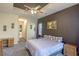 Primary bedroom features tray ceiling, natural lighting, and neutral tones at 138 Sugar Loaf Ln., Murrells Inlet, SC 29576