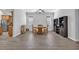 Open-concept dining room with tile flooring, abundant natural light, and a casual atmosphere at 138 Sugar Loaf Ln., Murrells Inlet, SC 29576