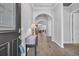 Bright and spacious foyer with tile flooring, archways, and elegant decor at 138 Sugar Loaf Ln., Murrells Inlet, SC 29576