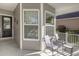 Inviting front porch with seating, offering a relaxing outdoor space at 138 Sugar Loaf Ln., Murrells Inlet, SC 29576
