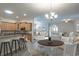 Bright living space showcasing open layout with kitchen, dining, and living room with modern decor at 138 Sugar Loaf Ln., Murrells Inlet, SC 29576