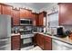 Well-equipped kitchen featuring stainless steel appliances, custom cabinets, and stylish countertops at 1604 Carsens Ferry Dr., Conway, SC 29526