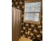 Bathroom featuring a shower curtain, paper holder, and a large window at 323 Sea Turtle Dr., Myrtle Beach, SC 29588