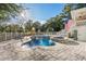 Beautiful pool with a spa and waterfall feature, set in a charming outdoor space at 437 N Boyle Dr., Pawleys Island, SC 29585