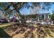 Charming single-story home with a large front yard, cozy porch, and mature tree with swing at 538 Calhoun Dr., Murrells Inlet, SC 29576
