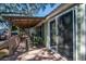 Inviting porch features a covered seating area, perfect for enjoying a peaceful outdoor setting at 538 Calhoun Dr., Murrells Inlet, SC 29576