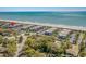 Aerial view highlighting the community's coastal setting near ocean and mature trees at 5601 N Ocean Blvd. # E-316, Myrtle Beach, SC 29577