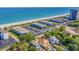 Aerial view shows proximity of condo community to a pristine beach with turquoise water at 5601 N Ocean Blvd. # E-316, Myrtle Beach, SC 29577