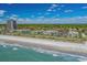 Aerial view showcasing the complex's proximity to the beach and lush natural surroundings at 5601 N Ocean Blvd. # E-316, Myrtle Beach, SC 29577