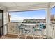 Balcony with table and chairs and beautiful ocean view at 5601 N Ocean Blvd. # E-316, Myrtle Beach, SC 29577