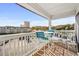 Bask in this relaxing balcony overlooking city and enjoy the condo's outdoor seating and ocean views at 5601 N Ocean Blvd. # E-316, Myrtle Beach, SC 29577