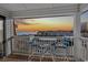 Enjoy this relaxing balcony with stunning sunset views and comfortable seating to enjoy this amazing condo at 5601 N Ocean Blvd. # E-316, Myrtle Beach, SC 29577