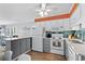Well-lit kitchen equipped with modern appliances, ample counter space, and stylish backsplash at 5601 N Ocean Blvd. # E-316, Myrtle Beach, SC 29577