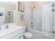 Bright bathroom with a single sink, toilet, mirror and shower at 830 San Marco Ct. # C, Myrtle Beach, SC 29579