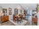 Elegant dining room with vaulted ceilings, chandelier, and access to the backyard at 830 San Marco Ct. # C, Myrtle Beach, SC 29579