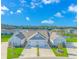 Charming townhomes with attached garages, manicured lawns, and beautiful landscaping near a pond at 830 San Marco Ct. # C, Myrtle Beach, SC 29579