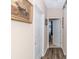 Hallway with hardwood floors leading to bedroom at 830 San Marco Ct. # C, Myrtle Beach, SC 29579