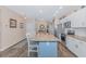 The kitchen boasts a long island with seating, stainless appliances, and ample counter space for cooking at 830 San Marco Ct. # C, Myrtle Beach, SC 29579