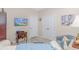 Bright living room featuring neutral walls, a flat screen TV, and two closets at 830 San Marco Ct. # C, Myrtle Beach, SC 29579