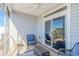 Relaxing screened porch with comfortable seating and water view at 830 San Marco Ct. # C, Myrtle Beach, SC 29579