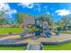 View of the community playground with slides and blue sky at 830 San Marco Ct. # C, Myrtle Beach, SC 29579