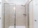 Modern shower with glass doors and tile surround at 830 San Marco Ct. # C, Myrtle Beach, SC 29579
