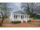 This charming home features a cozy front porch perfect for relaxing outdoors at 108 N Hazard St., Georgetown, SC 29440