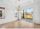 Dining room with sliding glass doors leading to backyard and a chandelier at 1219 Bent Creek Ln., Myrtle Beach, SC 29579